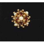 A 9 carat gold vintage dome ring set garnets and pearls, size H, 4.5g