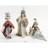Three Lladro figures - girl with dog, boy in top hat and girl with vase