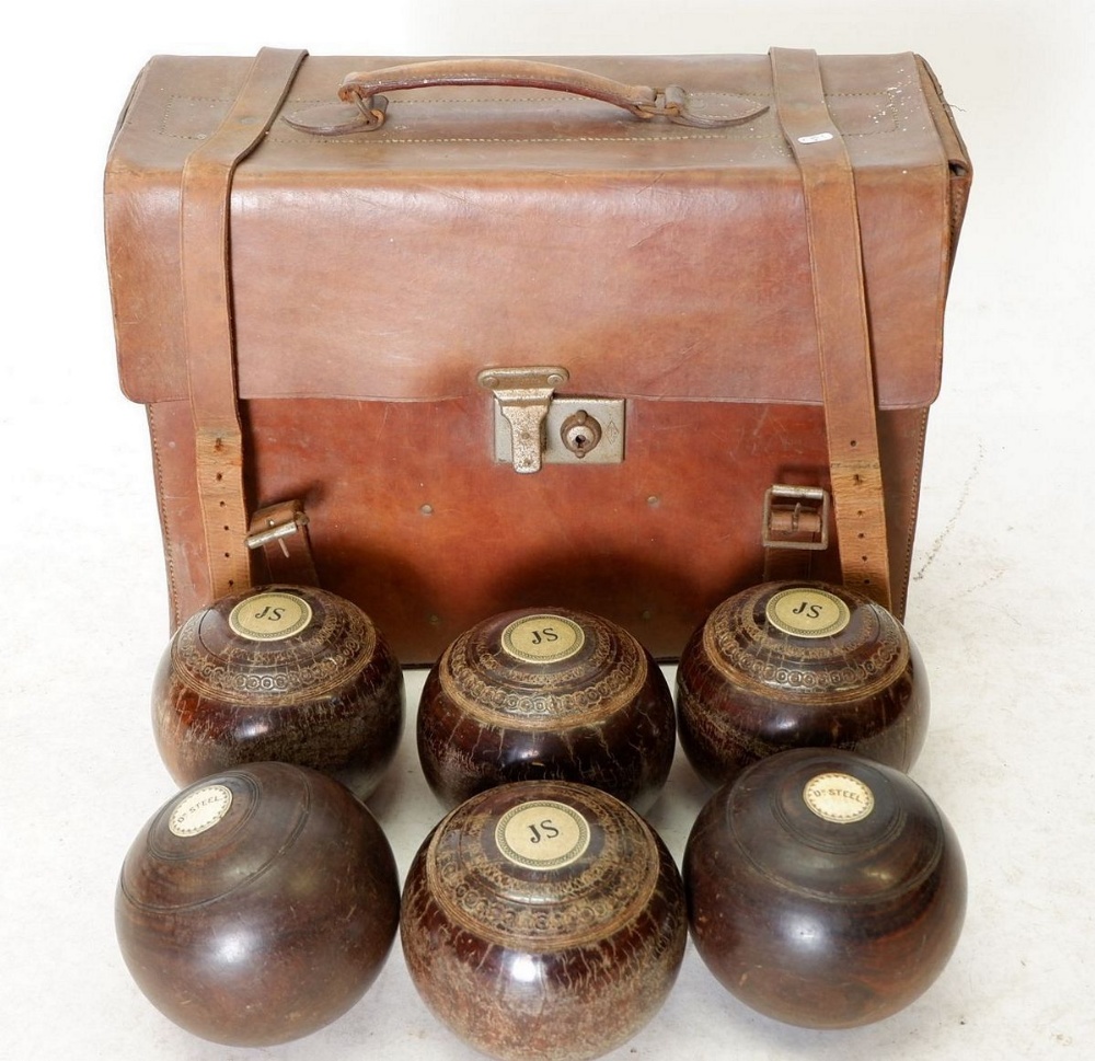 A set of six lawn green bowling balls, by Taylor London (some competition stamped 1951 and 1962 some