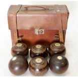 A set of six lawn green bowling balls, by Taylor London (some competition stamped 1951 and 1962 some