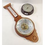 A modern Shortland barometer/thermometer and a Smiths Bakelite barometer