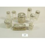 Nine various silver and glass toiletry jars and boxes
