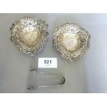A pair of pierced silver trinket dishes, Birmingham 1886, 9 x 8cm and a pair of small silver sugar