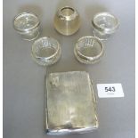 Two pairs of cut glass and silver salts, a silver mounted match striker and a silver cigarette case
