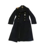 An officers naval great coat - property of Lt. Commander Thomas Frederick John Le Vierge who