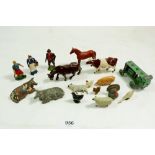 A small group of lead farm animals and figures