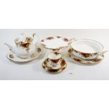 A Royal Albert Old Country Roses tea service and part dinner ware comprising: tea pot, six cups