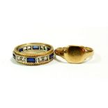 A 9 carat gold signet ring, size P, 3g and an eternity ring set sapphires and white stones, size