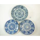 A Japanese late 19th century blue and white dish with stylised sunburst decoration, 27cm diameter