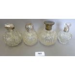 Four various Victorian silver and cut glass scent bottles