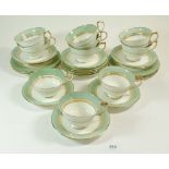 An Aynsley matched 'England' tea service comprising: ten cups, twelve saucers and six dessert plates