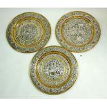 A set of three Indian brass salvers with applied white metal and copper decoration, 32cm