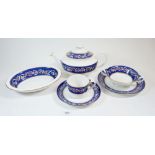 A Spode Ribbons and Roses dinner service comprising: teapot, four cups and saucers, four side