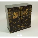 A Japanese lacquer table top small cabinet of drawers, height 22cm