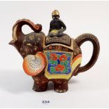 A novelty oriental elephant teapot
