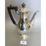 A silver half gadrooned coffee pot, London 1903, 457.2g total weight