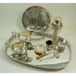 A silver plated tray, two sauce boats, salver, a cocktail shaker and cruet set etc.