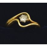 A 1970's 18 carat gold interlinking wedding ring and engagement solitaire diamond ring, size K, 4.
