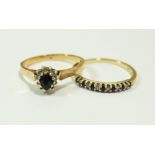 A 9 carat gold sapphire and diamond cluster ring, size M to N and a 9 carat gold line set sapphire