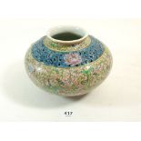 A 20th century Chinese squat form vase with floral decoration (hole to base)