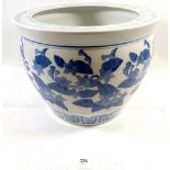 A large blue and white fish bowl style jardiniere, 27cm high x 34cm