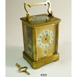A 19th century brass carriage clock with ivory dial and repeater, 13 cm (height)