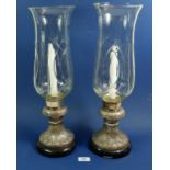 A pair of silver plated and glass candle lamps, overall height 47cm