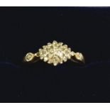 A 9 carat gold lozenge form ring set chip diamonds, size K to L