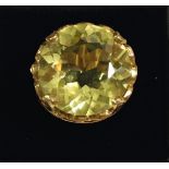 A 9 carat gold large citrine ring in fancy setting, total 15g - the stone 2.1cm diameter