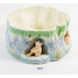 A Sylvac fruit bowl with seated imp and rabbits, 20cm