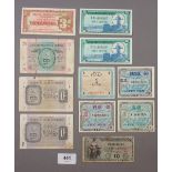 A wad of military currency notes 11 off including: British Military Authority: 1 shilling 1943 2