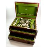 A mahogany cutlery box with inlay and two drawers under rise top - plus contents of silver plated
