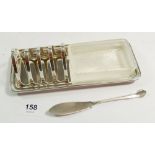 An Aspreys silver plated butter dish with integral toast rack