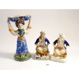 Two Victorian Staffordshire figures of seated Turkish men, 12cm tall and a continental pottery