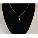 A 9 carat white gold pendant pearl necklace and chain