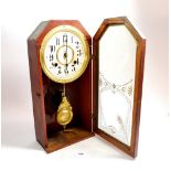 A Newhaven wall clock, 39 cm tall