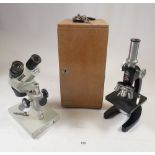 A Leeds microscope No 46376, cased and a Meiji microscope