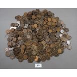 A large quantity of copper/bronze halfpennies and pennies Victoria through Elizabeth II some