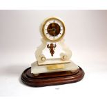 A Victorian alabaster mantel clock with cherub pendulum a/f, with presentation to Reverend Dash at