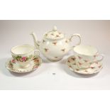 A Colclough tea service printed flowers comprising ten cups and five saucers, two sugars, jug,