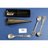 Three white metal decorative filigree spoons and a silver posy holder, Birmingham 1911, 75g, 13.