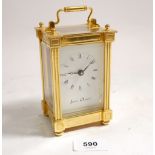 A Jen Olsen brass carriage clock, glass a/f, approx 12cm high