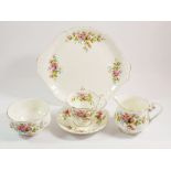 A Royal Albert 'Moss Rose' tea service comprising: five tea cups, five coffee cups and twelve