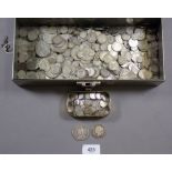 A metal strong box with key containing quantity of silver content coinage: pre 1920 silver