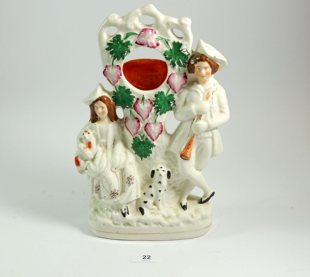 A Victorian Staffordshire watch stand with woman and dog, 30cm