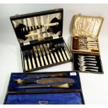 A horn handled carving set and various silver plated cutlery