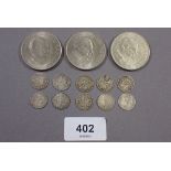 A group of ten silver three pences: Fine to VF and three Churchill Crowns