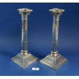 A pair of Corinthian silver column candlesticks (not filled), 30.5cm, Birmingham 1938 by Wm Adams