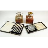 Two 1930's silver plated christening cups, cut glass butter dish, tea knives etc. all boxed