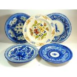 A group of five tin glazed plates and charger, marked RC and VC, approx. 35 cm diameter
